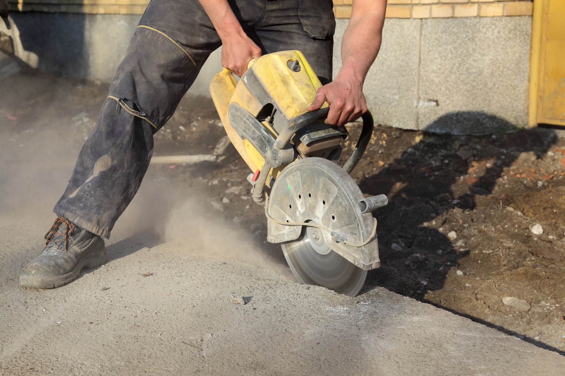 Construction site, worker and tool